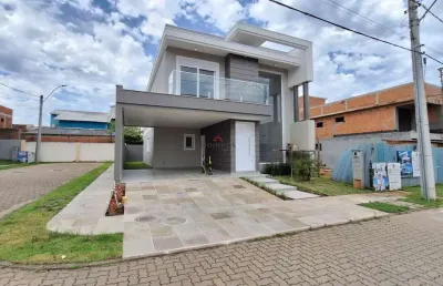 Moinhos imóveis vende sobrado em condomínio las brisas.