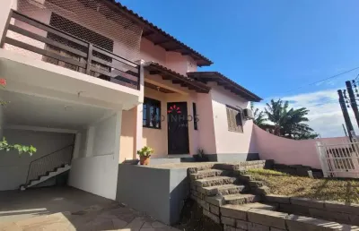 Casa-sobrado 4 dormitorios, 1 suite, edicula e vaga para 2 carros - bairro parque universitario em canoas