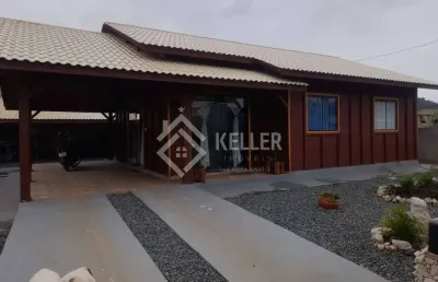 Casa com edícula em terreno amplo – 300m² | 3 quartos (1 suíte) | garagem coberta para 2 carros