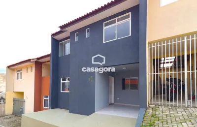 Sobrado com 3 quartos, garagem coberta e churrasqueira no bairro iguaçu