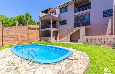 Casa com 3 quartos à venda na rua carlos barbosa, 283, guarani, novo hamburgo por r$ 660.000