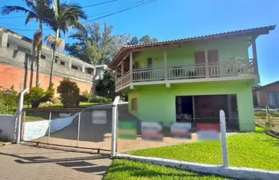 Casa com 4 quartos à venda na rua emílio fernando martini, 151, lomba grande, novo hamburgo por r$ 638.600