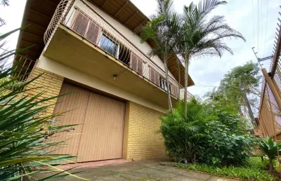 Casa com 3 quartos à venda na camaquã, 121, primavera, novo hamburgo por r$ 477.000