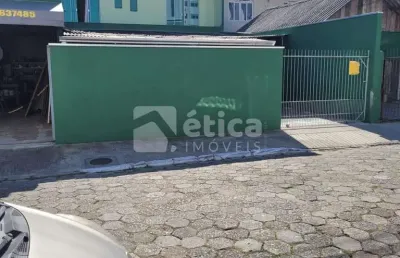 Casa a venda bairro são joão com 2 pavimentos ja dividida em 2 residencias