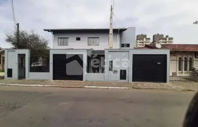 A venda em itajaí casa térrea e apartamento no piso superior, bairro são joão