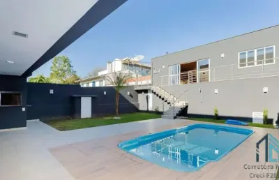 Casa permuta 100%, 03 suítes, piscina aquecida, 11 vagas, no uberaba em curitiba pr
