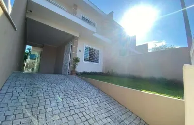 Sobrado geminado no iririú com 3 quartos para venda, 121 m²
