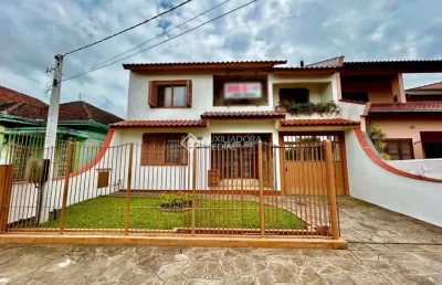 Casa com 3 quartos à venda na beco rui barbosa, 469, fátima, canoas, 196 m2 por r$ 940.000