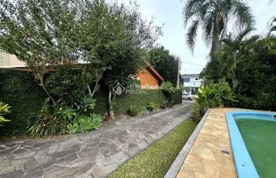 Casa com 3 quartos à venda na rua tomé de souza, 556, nossa senhora das graças, canoas, 320 m2 por r$ 1.800.000