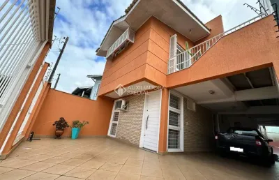 Casa com 4 quartos à venda na rua martinho lutero, 125, harmonia, canoas, 178 m2 por r$ 850.000