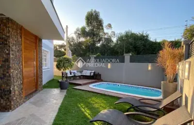 Casa com 3 quartos à venda na rua das angélicas, 516, estância velha, canoas, 188 m2 por r$ 1.190.000