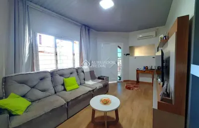 Casa com 3 quartos à venda na marta pugin, 63, harmonia, canoas, 150 m2 por r$ 319.200