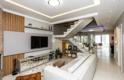 Casa em condomínio fechado com 4 quartos à venda na rua bélgica, 76, marechal rondon, canoas, 221 m2 por r$ 1.999.000