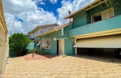 Casa com 3 quartos à venda na rua irmão adão rui, 398, marechal rondon, canoas, 241 m2 por r$ 1.690.000