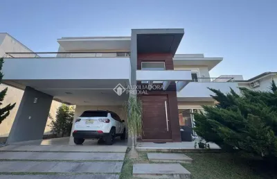 Casa em condomínio fechado com 3 quartos à venda na avenida açucena, 50, estância velha, canoas, 340 m2 por r$ 2.950.000