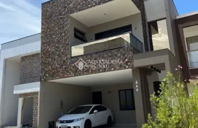 Casa em condomínio fechado com 3 quartos à venda na avenida deltaville, 150, beira rio, biguaçu, 205 m2 por r$ 1.495.000
