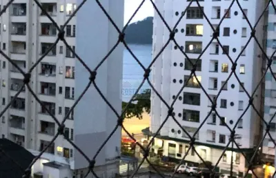 Apartamento com 85m², 2 quartos, 2 banheiros, 1 vaga, sacada e pequena vista mar