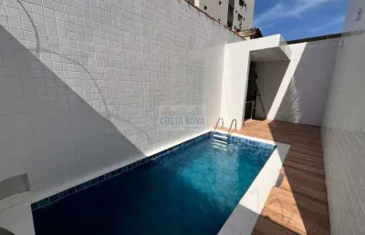 Casa sobreposta baixa nova de 180m², com 3 quartos e área com churrasqueira e piscina em santos