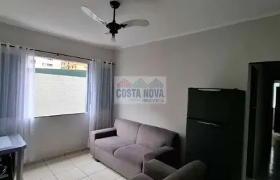 A poucos passos da areia: 1 dormitório com vista lateral para o mar