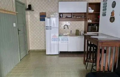 Kitnet à venda com 40m², 1 quarto, 1 banheiro e 1 vaga no bairro tupi em praia grande frente ao mar