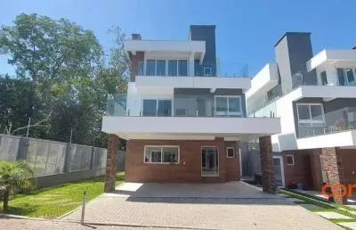 Casa com 4 dormitórios para alugar, 300 m² por r$ 18.500,00/mês - pedra redonda - porto alegre/rs