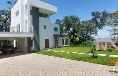 Casa com 4 dormitórios para alugar, 360 m² por r$ 30.400,00/mês - pedra redonda - porto alegre/rs