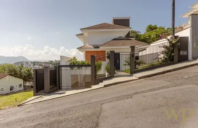 Casa com 4 quartos à venda na paulo ponick, 107, saguaçu, joinville por r$ 2.590.000