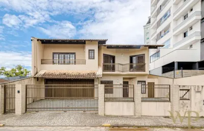 Casa com 3 quartos à venda na rua eça de queiros, 138, saguaçu, joinville por r$ 1.400.000