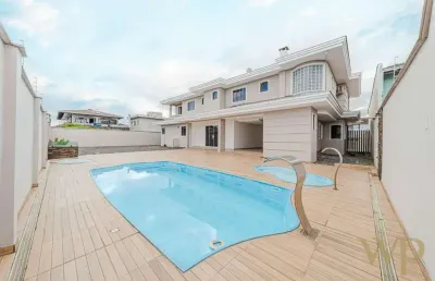 Casa com 6 quartos à venda na rua montezuma de carvalho, 56, iririú, joinville por r$ 1.750.000