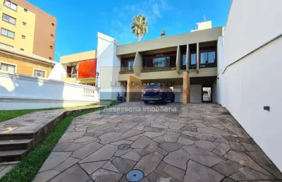 Casa 5 dormitórios à venda no bairro menino deus com 455 m² de área privativa - 6 vagas de garagem