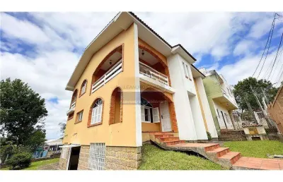 Casa 3 dormitórios à venda no bairro centro com 331 m² de área privativa - 2 vagas de garagem