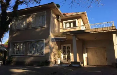 Casa 5 dormitórios à venda no bairro petrópolis com 330 m² de área privativa - 8 vagas de garagem