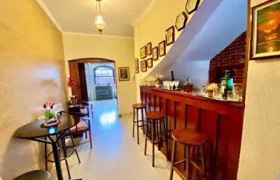 Casa com 3 dormitórios à venda, 152 m² por r$ 690.000,00 - marapé - santos/sp