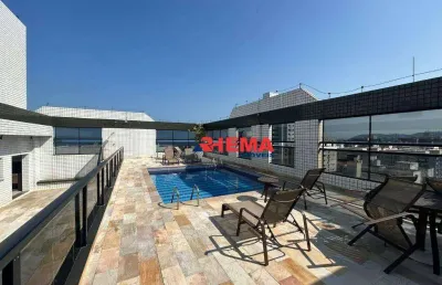 Apartamento na aparecida, meia quadra da praia, dois dorm. c/ suíte