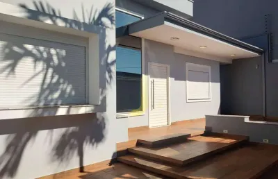 Casa com edícula e piscina e passagem lateral no tropical 3