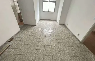 Apartamento térreo | 02 dorm | garagem coletiva | 60m² | centro - são vicente.