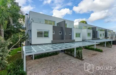 Casa em condomínio fechado com 3 quartos à venda na rua doutor ney de castilhos ferreira, 300, pedra redonda, porto alegre, 494 m2 por r$ 2.750.000