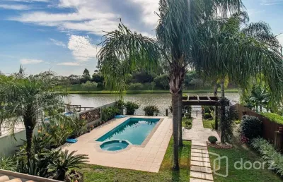 Casa em condomínio fechado com 4 quartos à venda na avenida juca batista, 9000, belém novo, porto alegre, 387 m2 por r$ 2.487.500