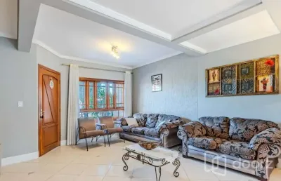 Casa em condomínio fechado com 4 quartos à venda na avenida juca batista, 1458, ipanema, porto alegre, 202 m2 por r$ 749.000