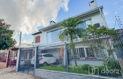 Casa com 4 quartos à venda na rua pedro waine, 194, santa maria goretti, porto alegre, 233 m2 por r$ 835.000