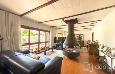 Casa com 3 quartos à venda na rua engenheiro ildefonso simões lopes, 215, três figueiras, porto alegre, 290 m2 por r$ 3.100.000