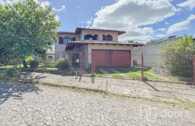 Casa com 5 quartos à venda na rua vicente celestino, 430, parque dos maias, porto alegre, 208 m2 por r$ 579.000
