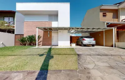 Casa em condomínio fechado com 3 quartos à venda na rua eroni soares machado, 74, campo novo, porto alegre, 230 m2 por r$ 800.000
