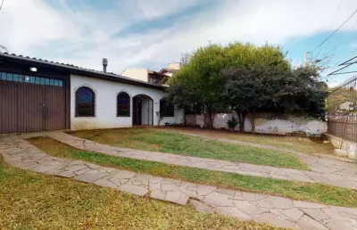 Casa com 4 quartos à venda na avenida guarujá, 136, guarujá, porto alegre, 160 m2 por r$ 480.000