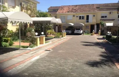 Casa em condomínio fechado com 3 quartos à venda na rua doutor barcelos, 2317, tristeza, porto alegre, 210 m2 por r$ 693.000