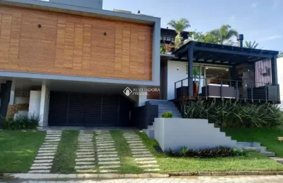 Casa em condomínio fechado com 3 quartos à venda na das flores, 19, morrinhos, garopaba, 388 m2 por r$ 2.900.000