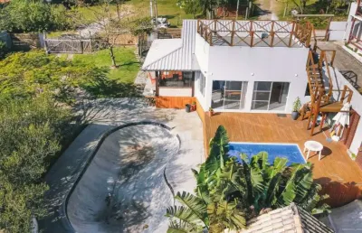 Casa com 5 quartos à venda na porto novo, 7643, praia do rosa, imbituba, 304 m2 por r$ 1.790.000