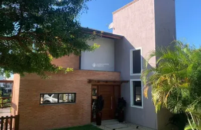 Casa em condomínio fechado com 3 quartos à venda na das amendoeiras, 888, morrinhos, garopaba, 210 m2 por r$ 3.080.000