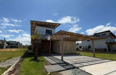 Casa em condomínio fechado com 3 quartos à venda na rodolfo sampaio, 80, zona rural, garopaba, 301 m2 por r$ 2.599.000