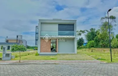 Casa em condomínio fechado com 4 quartos à venda na porto novo, 690, praia do rosa, imbituba, 360 m2 por r$ 2.000.000